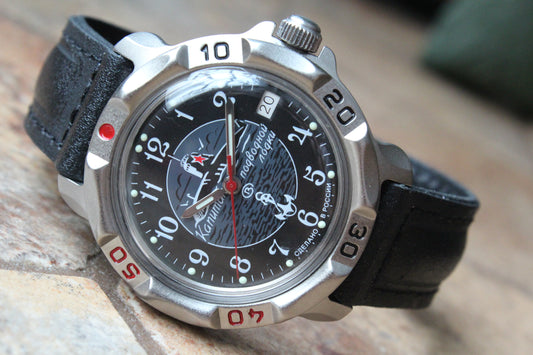 Vostok Komandirskie 816831 - close-up of black submarine emblem dial and date window