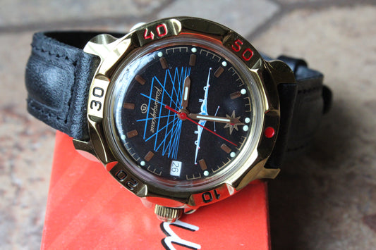 Vostok Komandirskie 819499 - three-quarter front view on original presentation box