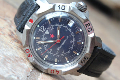Vostok Komandirskie 816398 - close-up of dark blue military emblem dial and date window
