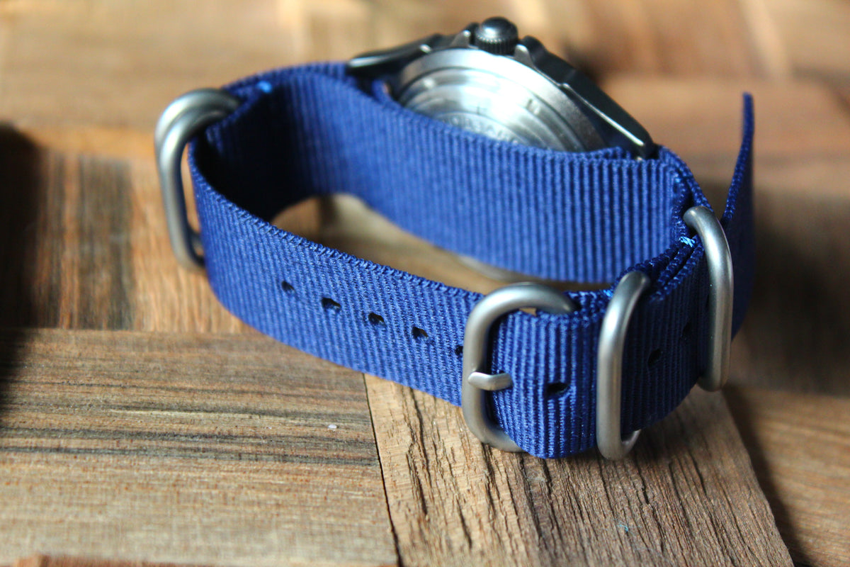 Vostok Komandirskie 30601G - rear view of blue nylon strap and metal buckle
