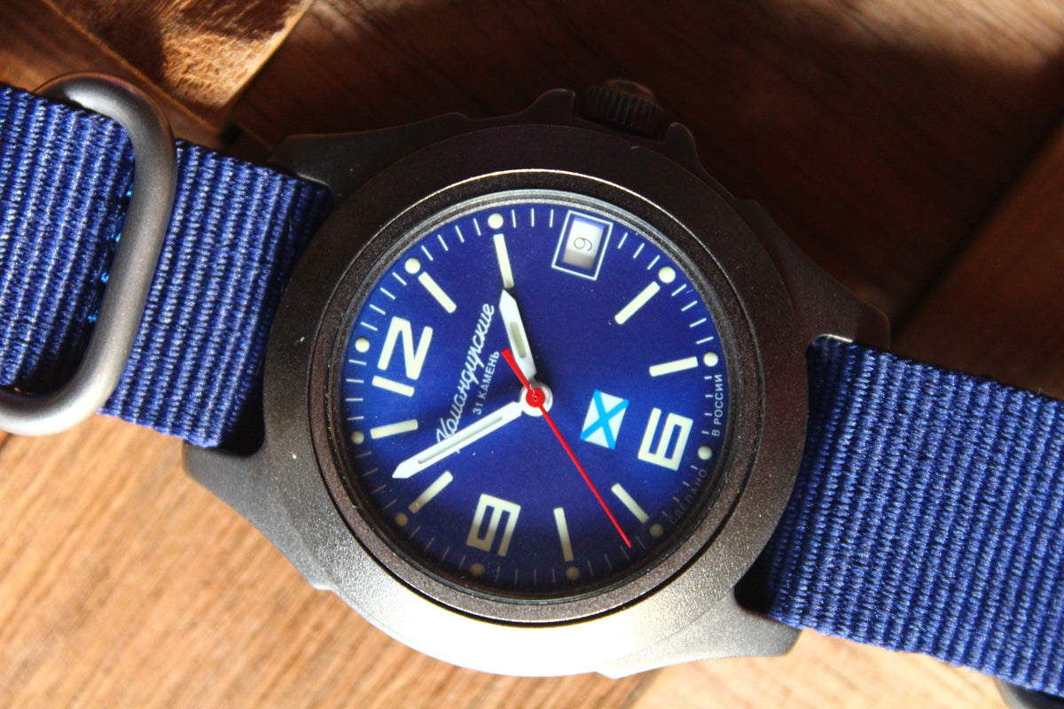Vostok Komandirskie 30601G - close-up of blue dial, date window and nylon strap