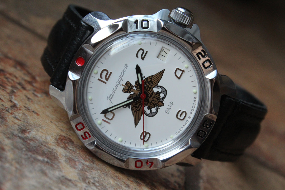 Vostok Komandirskie 811829 - diagonal front view with white naval emblem dial, complete case and crown