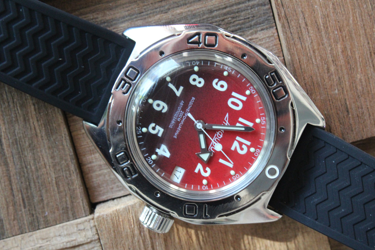 Vostok Amphibia 67069B - close-up of red dial, date window and numbered bezel