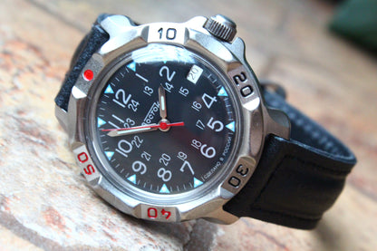 Vostok Komandirskie 816783 - close-up of black military emblem dial and date window