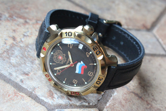Vostok Komandirskie 819453 - diagonal front view with complete dial, case and crown, 12 oclock toward upper left
