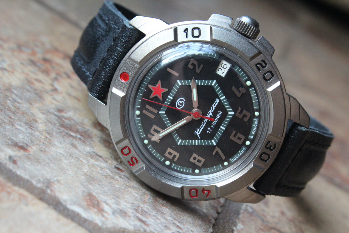 Vostok Komandirskie 436744 - front dial detail with red star, date window and numbered bezel