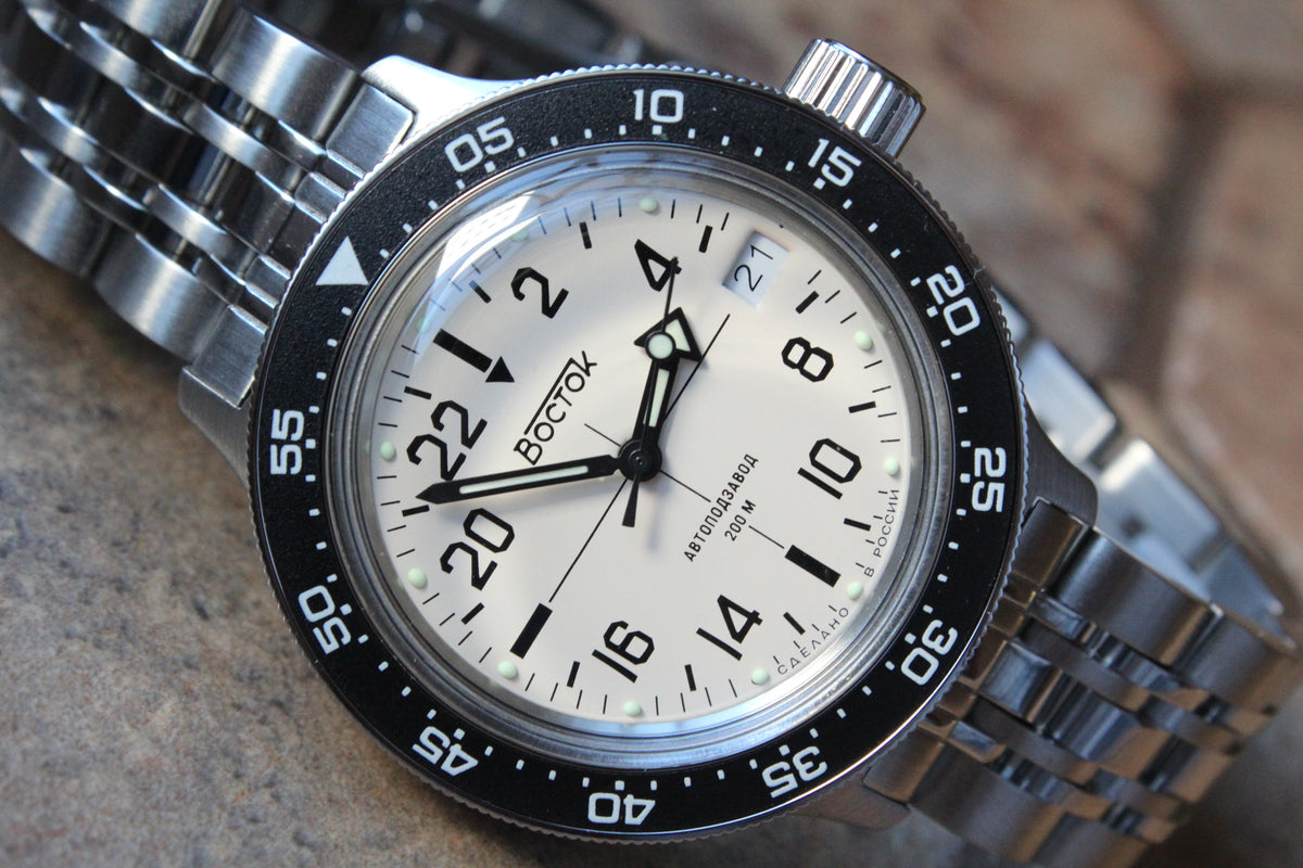 Vostok Amphibia 720074 - diagonal front view with white dial, complete case and crown