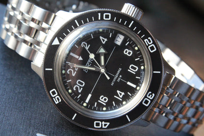 Vostok Amphibia 720076 - diagonal front view with black dial, complete case and crown