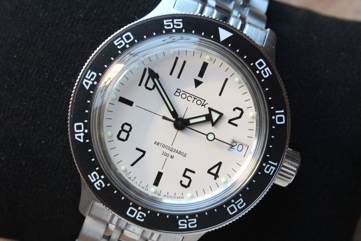 Vostok Amphibia 720070 - close-up of white dial, date window and black bezel