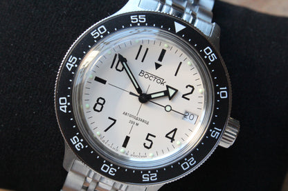Vostok Amphibia 720070 - close-up of white dial, date window and black bezel