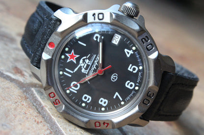 Vostok Komandirskie 816306 - close-up of black tank emblem dial, date window and bezel