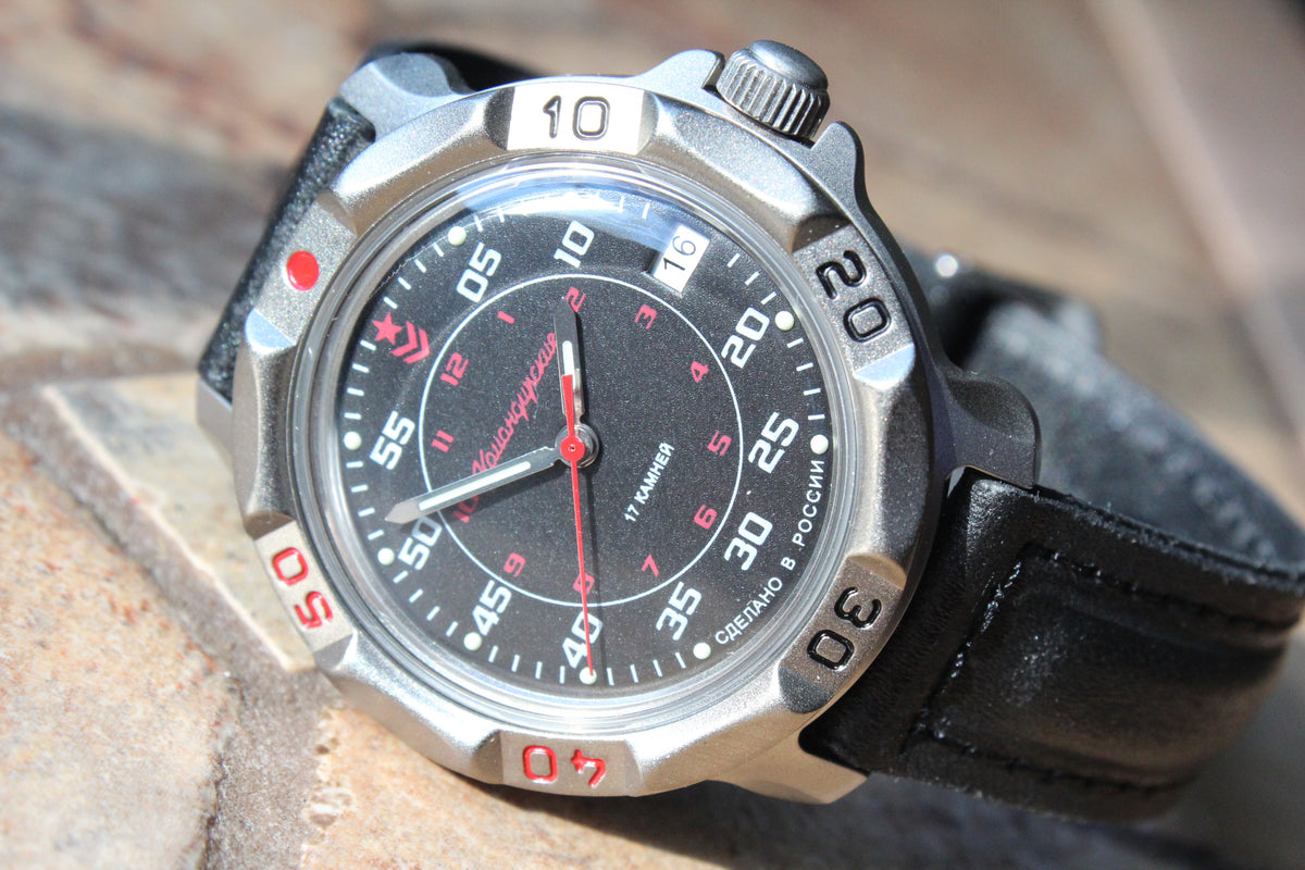 Vostok Komandirskie 816172 - close-up of black and red military dial, date window and bezel