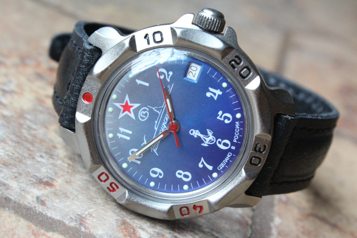 Vostok Komandirskie 816289 - diagonal front view with blue naval emblem dial, complete case and crown, 12 oclock toward upper left