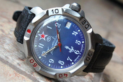 Vostok Komandirskie 816289 - close-up of blue naval emblem dial, date window and bezel