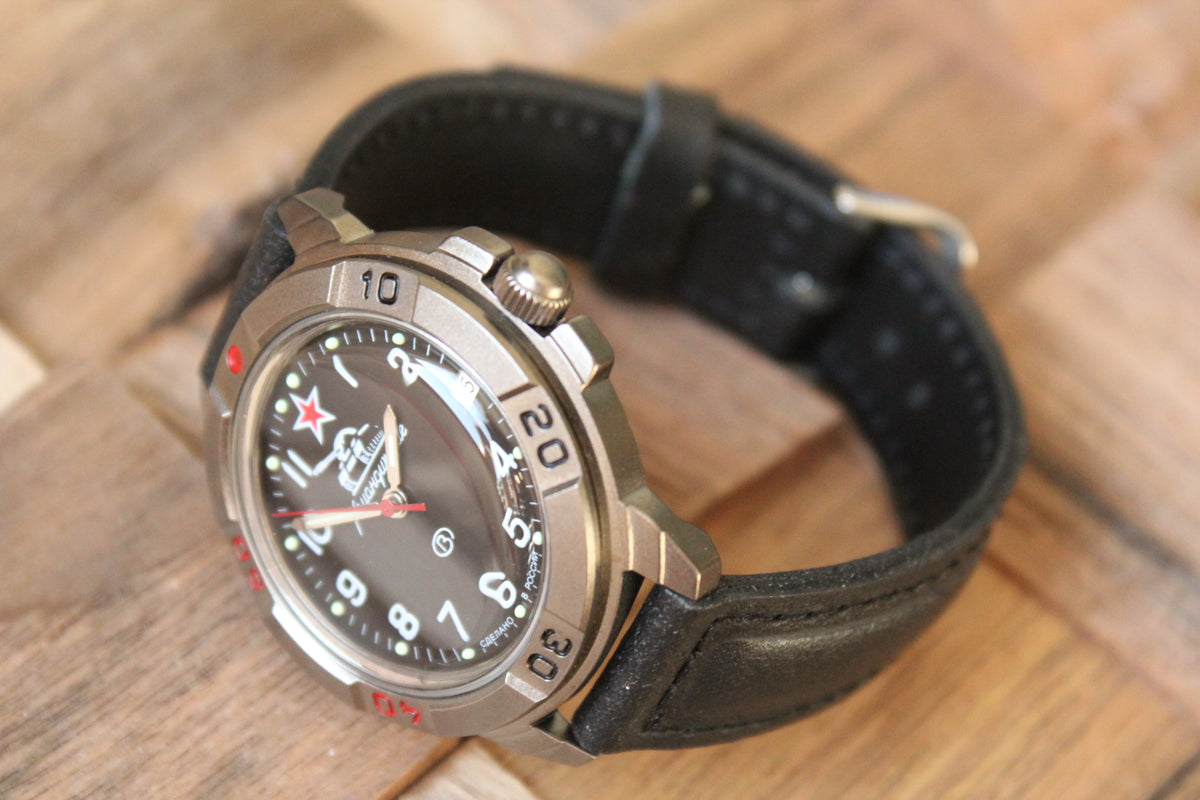 Vostok Komandirskie 436306 - diagonal front view with curved black leather strap