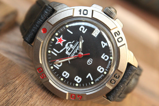 Vostok Komandirskie 436306 - black dial detail with date window and numbered bezel