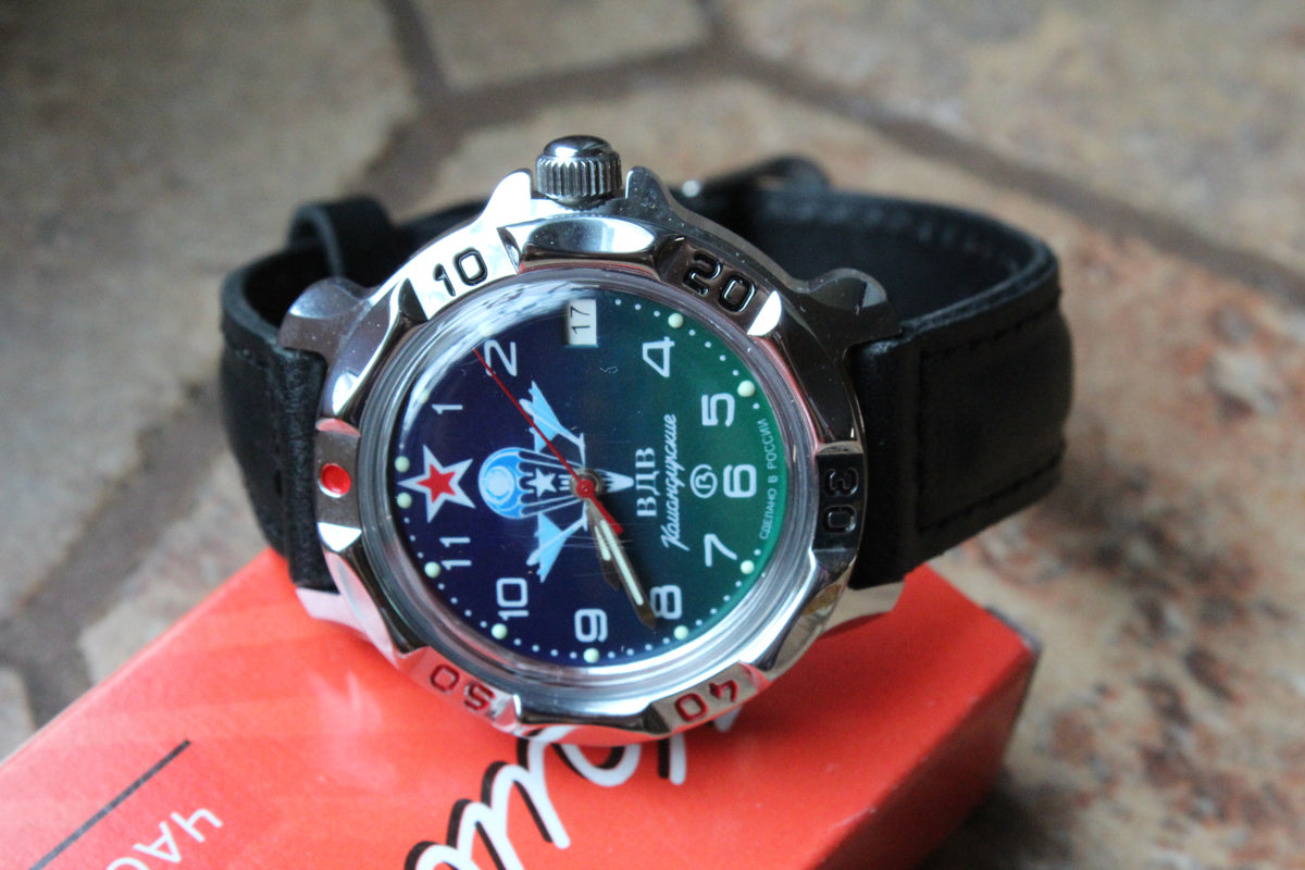 Vostok Komandirskie 811818 - diagonal front view with complete dial, case and crown, 12 oclock facing left