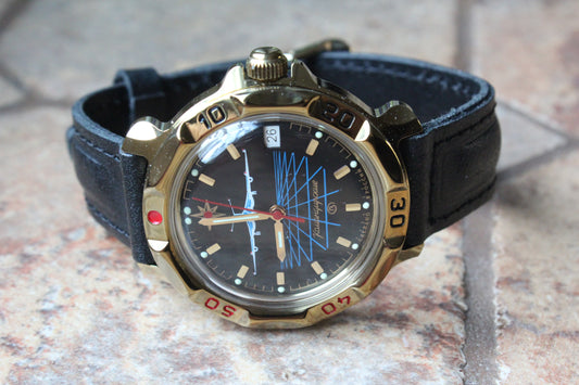 Vostok Komandirskie 819499 - diagonal front view with complete dial, case and crown, 12 oclock toward left