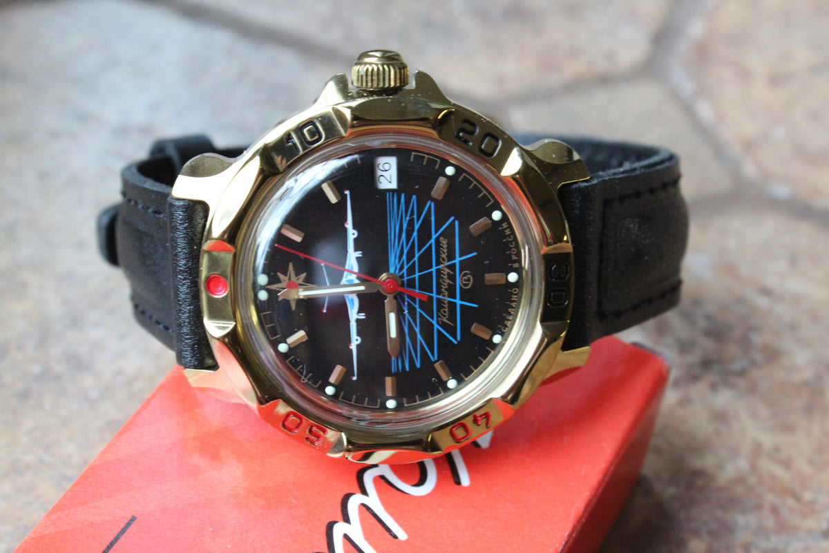 Vostok Komandirskie 819499 - alternate front view of case and leather strap