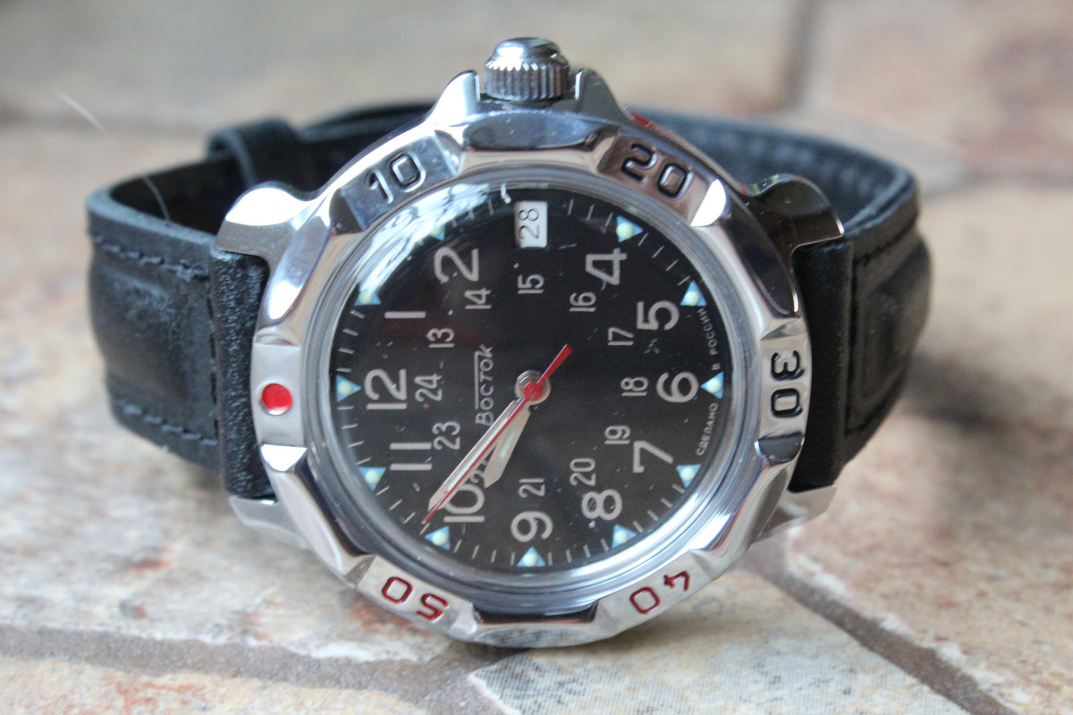 Vostok Komandirskie 811783 - diagonal front view with complete dial, case and crown, 12 oclock facing left