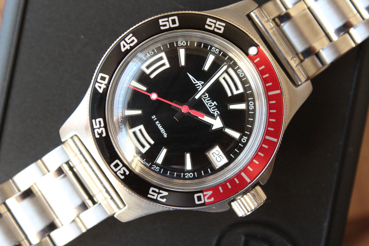 Vostok Amphibia 740387 - diagonal front view with black dial, complete case and crown
