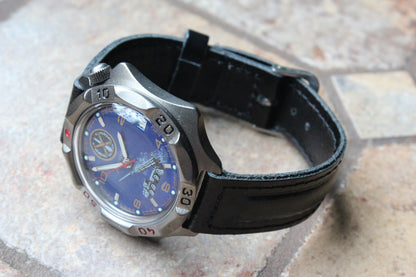 Vostok 536772 - diagonal front view with curved leather strap
