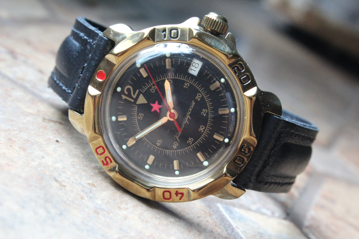 Vostok Komandirskie 819399 - diagonal front view with complete dial, case and crown, 12 oclock toward upper left