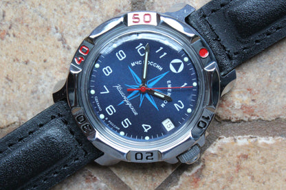Vostok Komandirskie 811942 - close-up of blue EMERCOM emblem dial and bezel