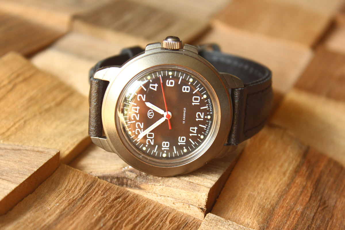 Vostok Komandirskie 43622G - front view with curved black leather strap