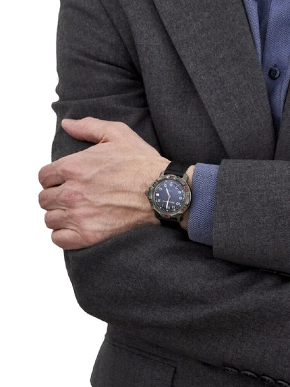 Vostok Komandirskie 81687B - watch shown on wrist with suit